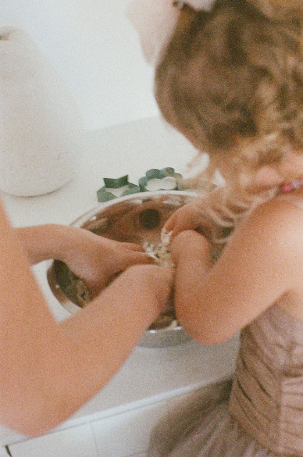 Little hands mixing a bowl